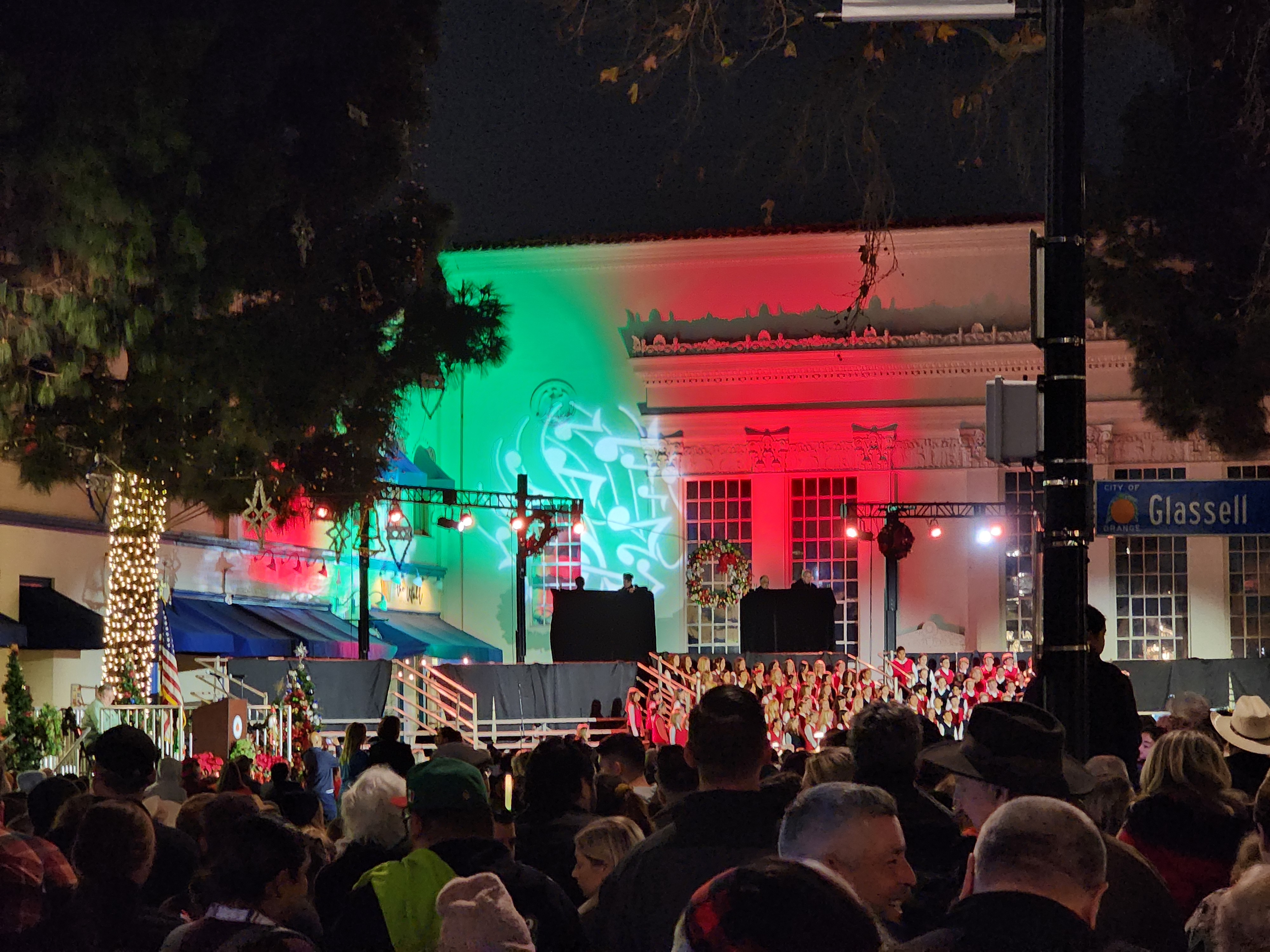 Old Town Orange Plaza fountain tree lighting with choir on the Glassell Street stage